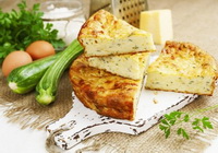 Фото к рецепту: Запеканка с кабачками и творогом