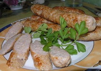 Фото к рецепту: Куриные колбаски в мультиварке